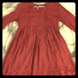 A mauve knee length (on me, 5”3) . Size Small.